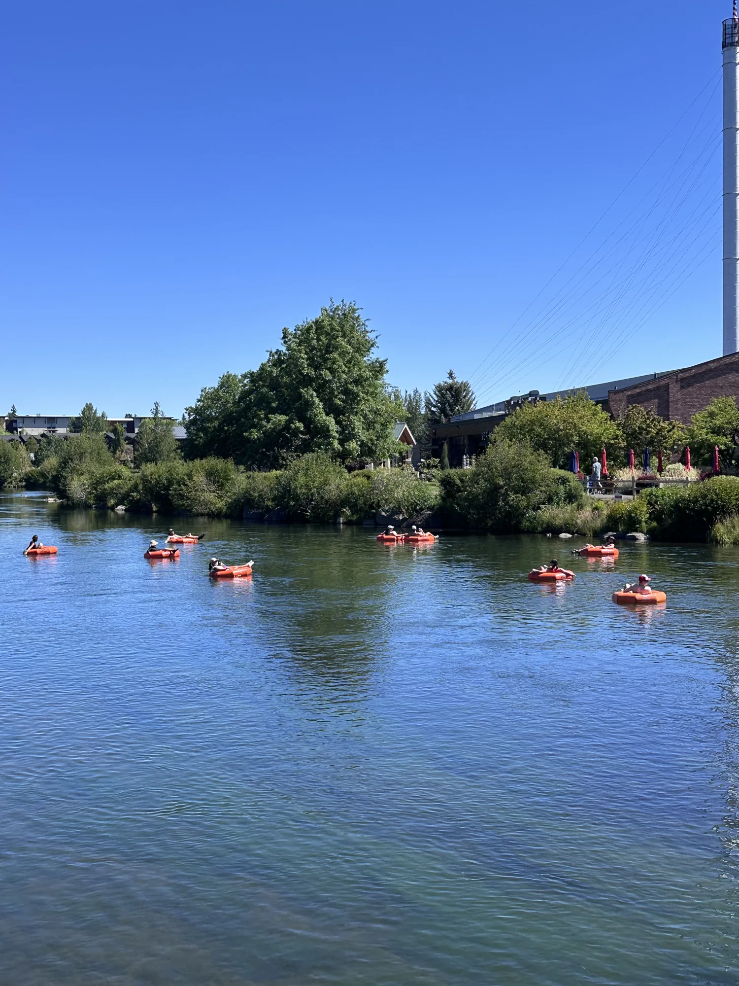 People paddling and enjoying the river in Bend, Oregon